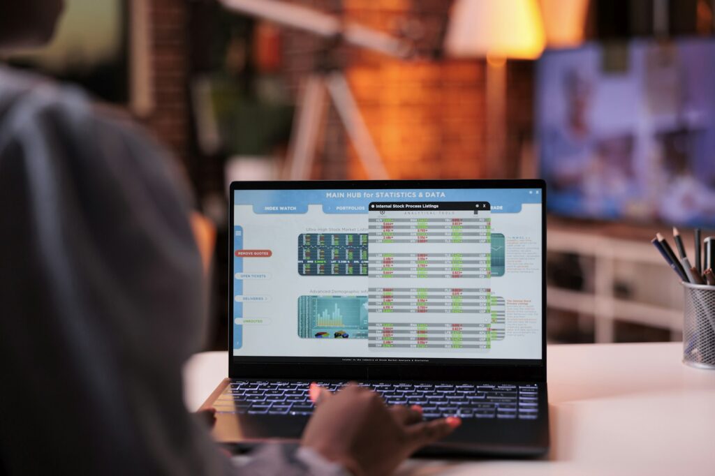 Company financial statistics on laptop screen, corporate accounting service